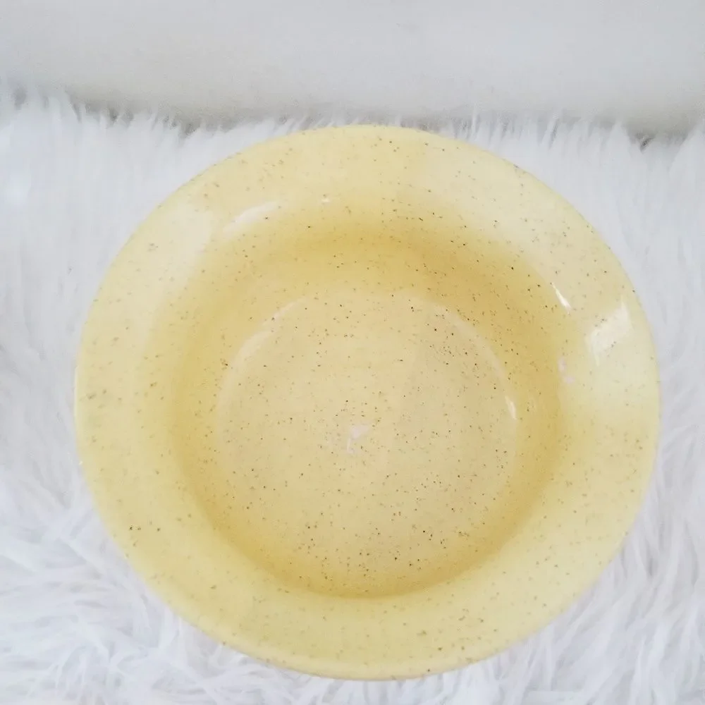 Pottery mixing bowl leaf pattern.